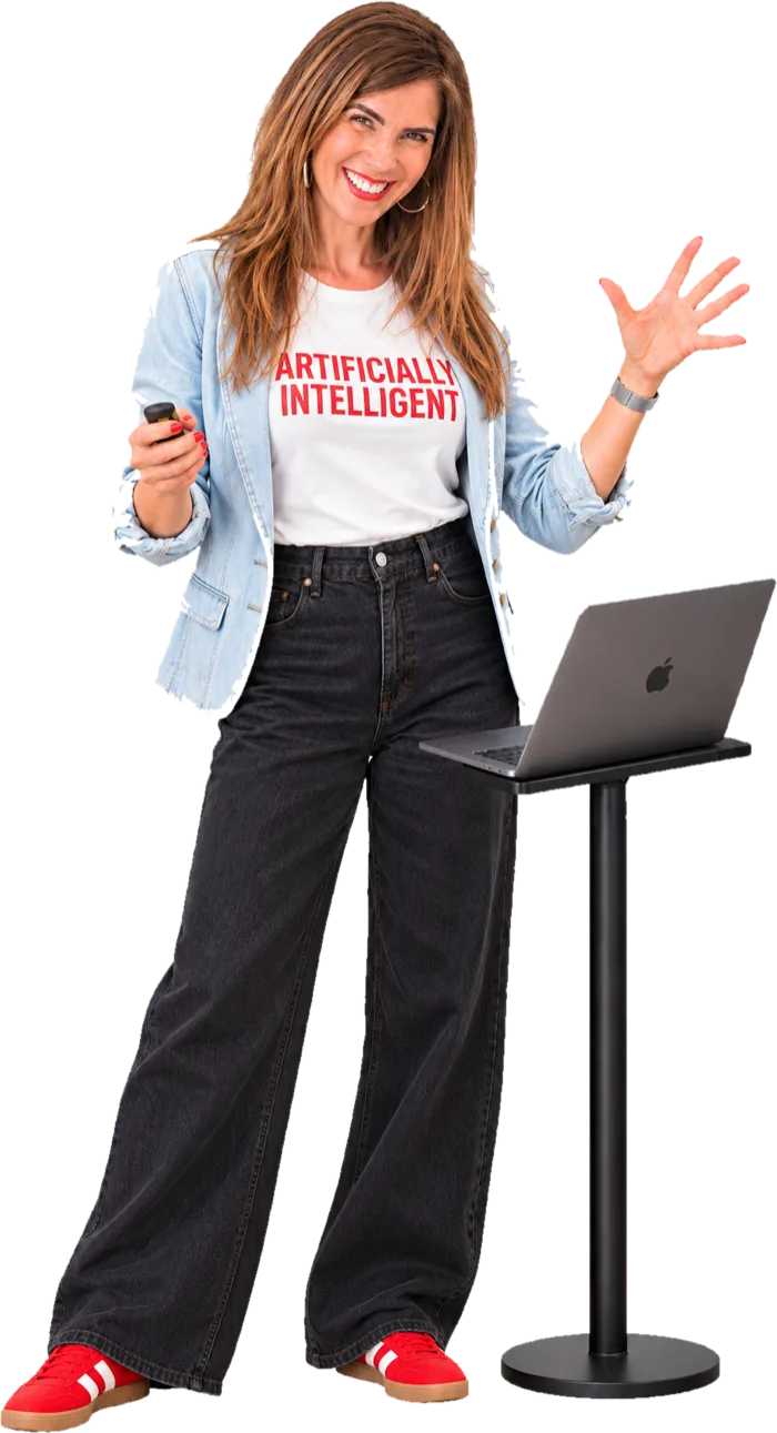 Chelsea Rustrum teaching an AI course, standing at a laptop