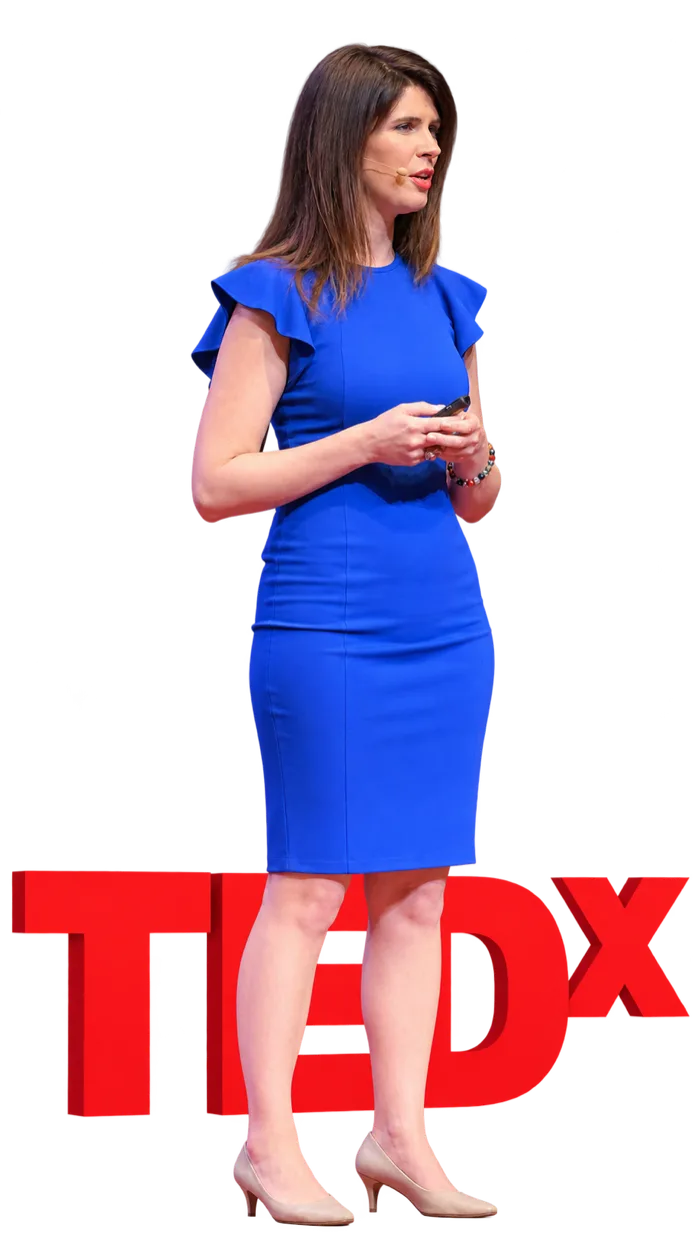 Chelsea Rustrum speaking on the TEDx stage