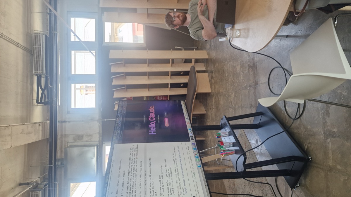Hello, Claude on the big screen as a CoLab AI course begins