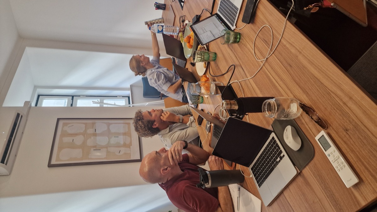 Small group deep in a working session at a CoLab AI course