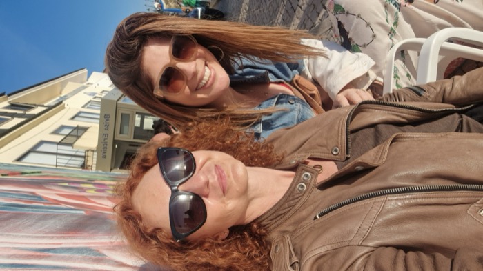 Chelsea Rustrum and a friend on a sunny afternoon in Ericeira