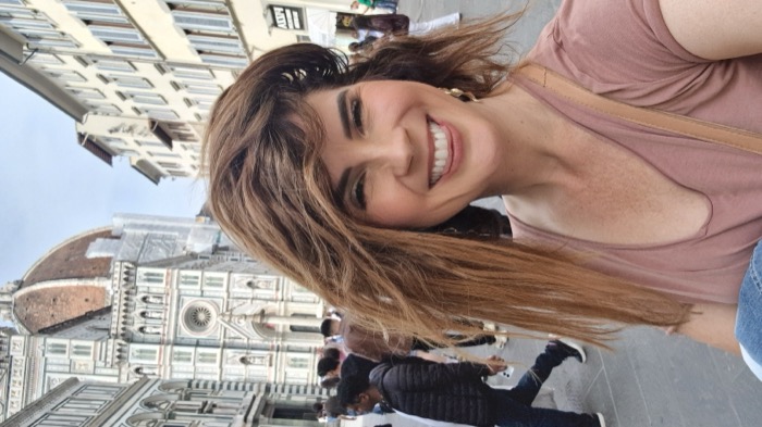 Chelsea Rustrum in front of the Florence Duomo