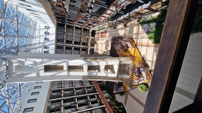 Atrium of the Nomad Apartments building in Bansko